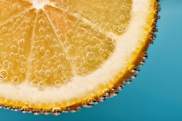 Macro of a lemon slice with bubles..