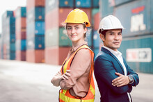 Smart Creative Foreman And Engineer Woman Wear Safety Uniform Standing And Arm Crossed Containers Box Background. Logistic, Transportation, Import And Export Concept. Copy Space.