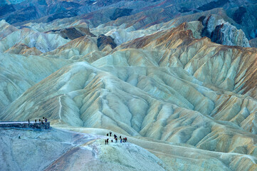 Poster - An aerial shot of the people hiking in the  shot of the amazing landscapes at daytime