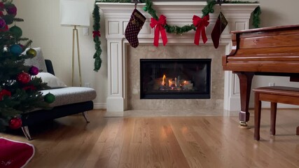 Wall Mural - Glowing fireplace in family living room for the winter holiday season in 4K format 