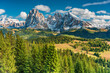 landscape with mountains trees and sky with beautiful clouds Alpe di Siusi Seiseralm