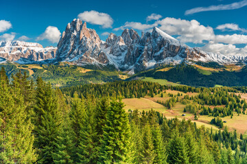 landscape with mountains trees and sky with beautiful clouds alpe di siusi seiseralm