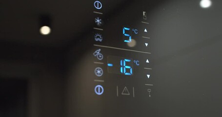 digital display of the refrigerator with temperature information. Slow motion.