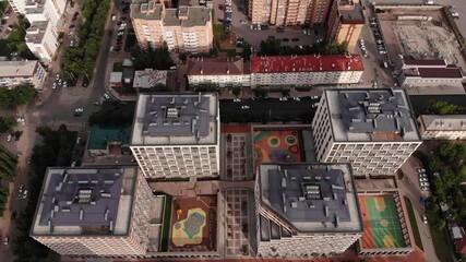 Wall Mural - Flying over houses and streets. View from the height.