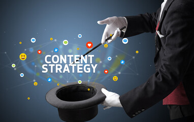 Magician is showing magic trick with CONTENT STRATEGY inscription, social media marketing concept