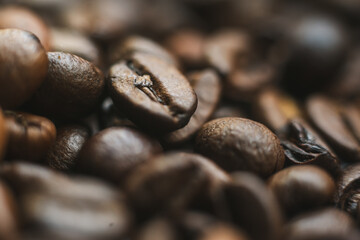 Sticker - Closeup of roasted coffee beans. Great aromatic coffee enjoyment in the morning. Macro perspective