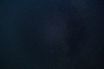 Wall Mural - starry sky background, texture night photo with long exposure