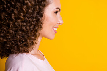 Photo portrait cropped close-up profile of woman's teeth face isolated on vivid yellow colored background