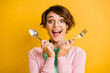 Photo of funky excited lady hold spoon fork open mouth wear glasses teal shirt pink cardigan isolated yellow color background