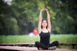 © NITIKAN T. - Asian woman is warm up, To make the muscles flexible Before going to jogging for good health and energy metabolism,Outdoors cross training workout. Healthcare concept