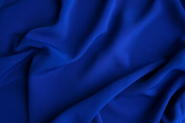 the fabric is dark blue. material background.