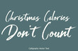 © Image Lounge - Christmas Calories Don’t Count Brush Typography Text Phrase on Grey Background