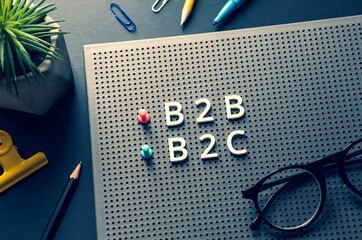 Business marketing with b2b,b2c,c2c text on desk table.management and e-commerce