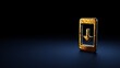 © Destrosvet - 3d rendering symbol of mobile phone wrapped in gold foil on dark blue background