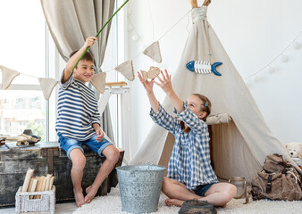 Wall Mural - Children catching fish with rod