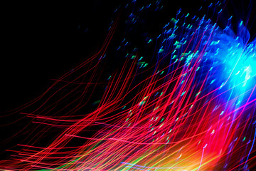 Wall Mural - Abstract motion curved lights on dark background