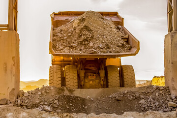 a truck carrying soil - a platinum mining in south africa