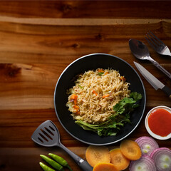 Fresh delicious food with wood board background.