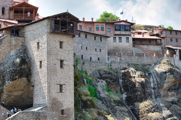 Wall Mural - The Meteora is a rock formation in central Greece hosting one of the largest and most precipitously built complexes of Eastern Orthodox monasteries.