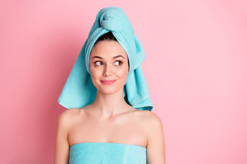 Wall Mural - Portrait of young happy positive lovely cute dreamy girl look copyspace wear teal turban isolated on pink color background