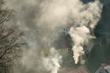 Fototapeta  - Dym nad miasteczkiem
