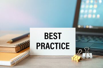 best practice - an inscription on a card near office supplies
