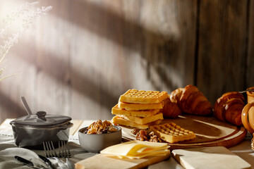 Wall Mural - Breakfast on the table in the morning soaking up the sun