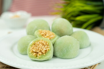 Chinese dessert or sweet mochi with ground peanut and sugar filling