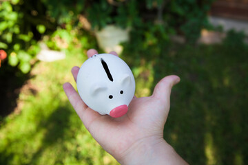 piggy bank in a hand