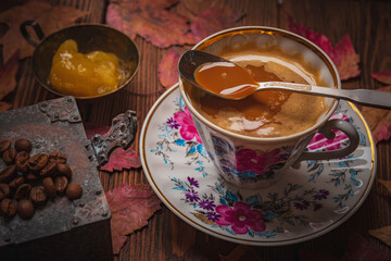 Wall Mural - Still life- autumn motif. Breakfast- cup of coffee is on the tab