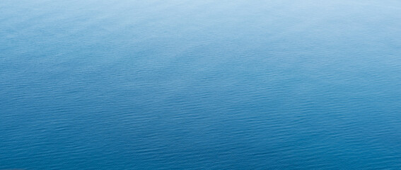 Wall Mural - sea blue water surface texture background, aerial view, vacation travel concept