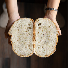 Seeded sourdough bread cut into two halves