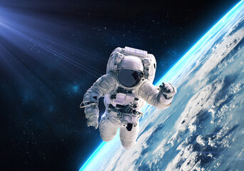 Wall Mural - science fiction walpaper of a lonely astronaut in free spacewalk orbit earth planet globe with glow 