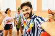 © kleberpicui - Brazilian Carnival. Young man in costume taking a self portrait