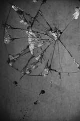 Cracked and broken glass and concrete abstract pattern