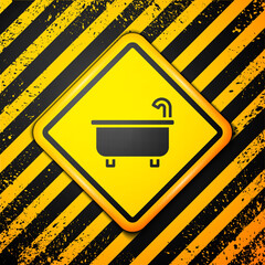 Sticker - Black Bathtub icon isolated on yellow background. Warning sign. Vector.