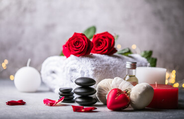 Wall Mural - Wellness decoration, spa massage setting,  oil on stone background. Valentine's Day Zen and relax concept.