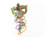 Mardi Gras Mask And Colorful Beads On White Background