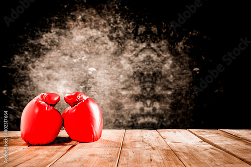 Fotografering Boxing gloves on a wooden table before the fight of old