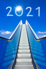 Better New Year Concept. 2021 Text On Blue Sky During A Sunny Day, Signifying A Brighter And Better Future.