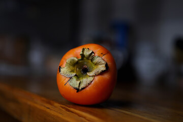 juicy persimmon close-up on the table