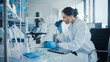 © Gorodenkoff - Medical Development Laboratory: Portrait of Beautiful Caucasian Female Scientist Looking Under Microscope, Analyzes Petri Dish Sample. People do Medicine, Biotechnology Research in Advanced Lab