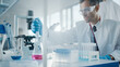 © Gorodenkoff - Medical Development Laboratory: Male Scientist Uses Micro Pipette for Filling Test Tubes with Liquid, Conducting Experiment. Big Pharmaceutical Lab with Specialists Research Medicine, Biotechnology