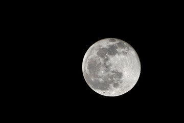 Deer Moon. Super full moon with dark background. Madrid, Spain, Europe. Horizontal Photography. 21. July. 2024. Moon. Supermoon. Sulfur. Conjunction. Venus. Saturn. Jupiter. First moon year.