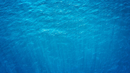 Wall Mural - blue sea surface aerial view