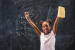 © Impact Photography - Mixed race elementary school girl happy after getting an A in math