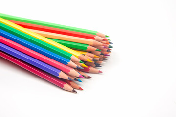 Wall Mural - set of colored pencils for drawing on a white background. marketing in business sales