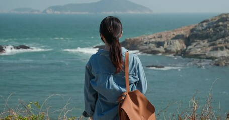 Poster - Woman enjoy the sea view