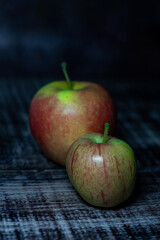 red apple on wooden table