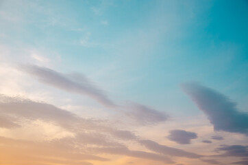 Wall Mural - Colorful sky background with clouds at sunset